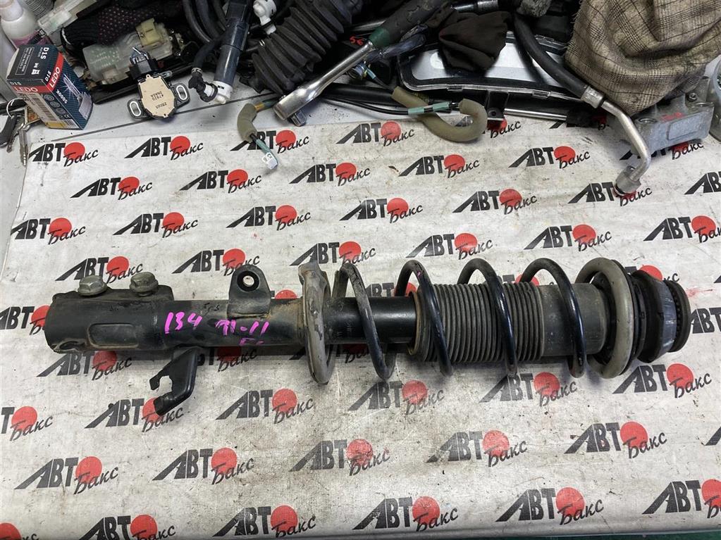 NISSAN NOTE E12/HE12/NE12/SNE12 для Стойка передняя левая