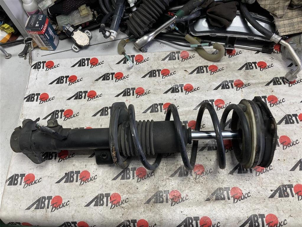 NISSAN TIIDA C11/SC11 для Стойка передняя правая