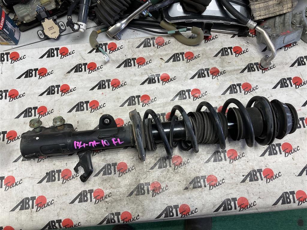 NISSAN NOTE E12/HE12/NE12/SNE12 для Стойка передняя левая